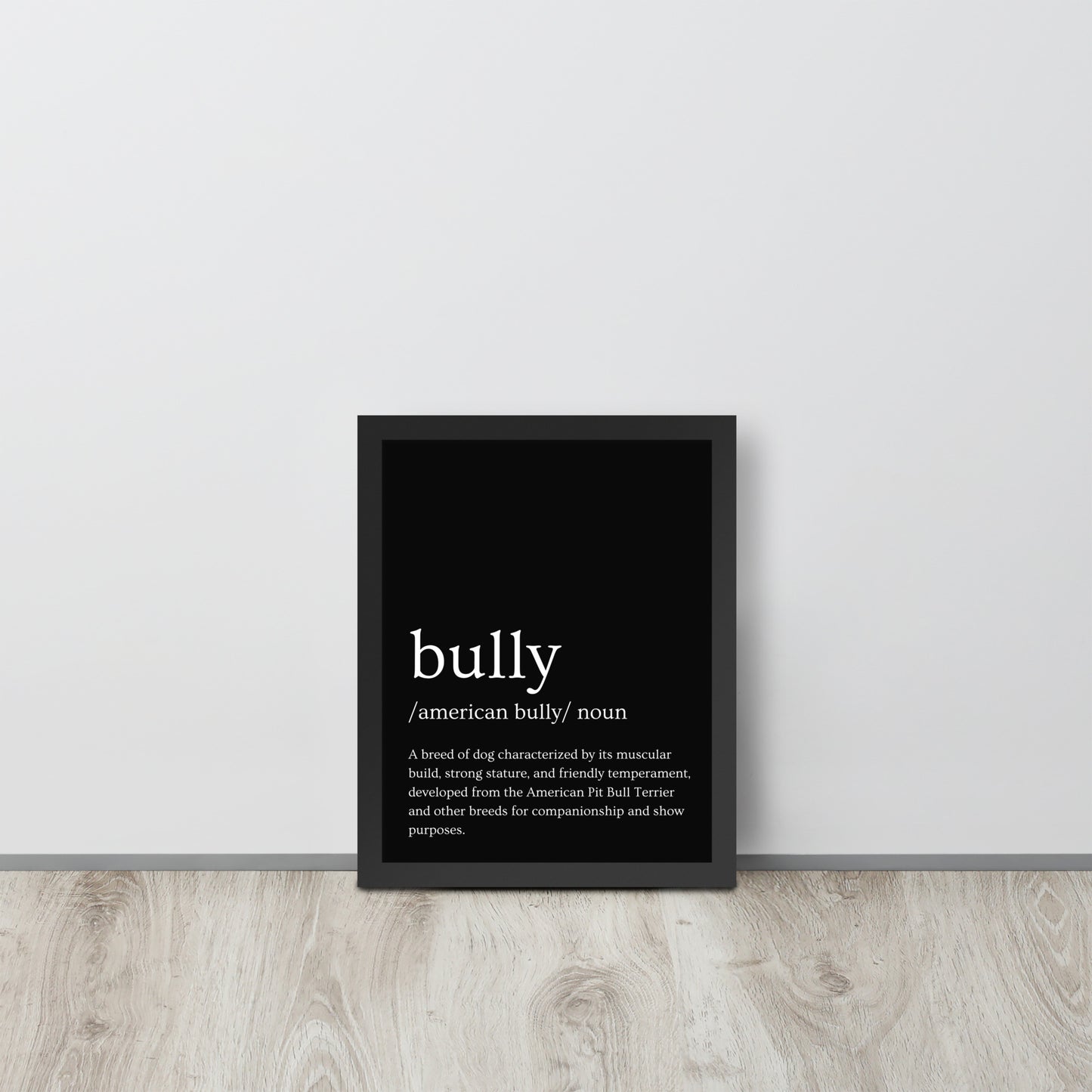 The American Bully breed is defined on a framed dictionary bully poster.