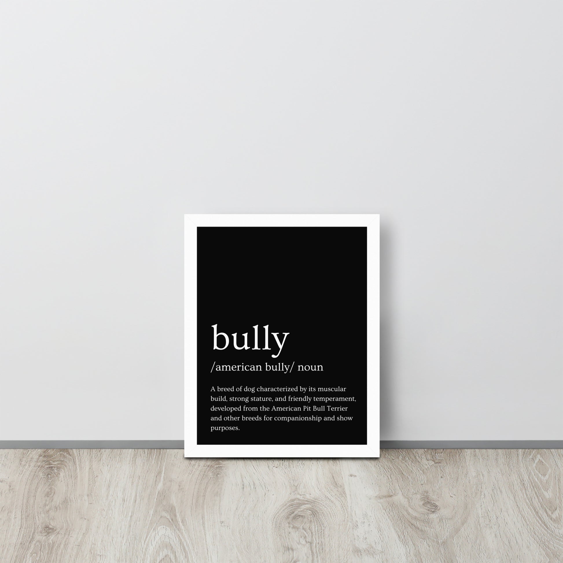 The American Bully breed is defined on a framed dictionary bully poster.