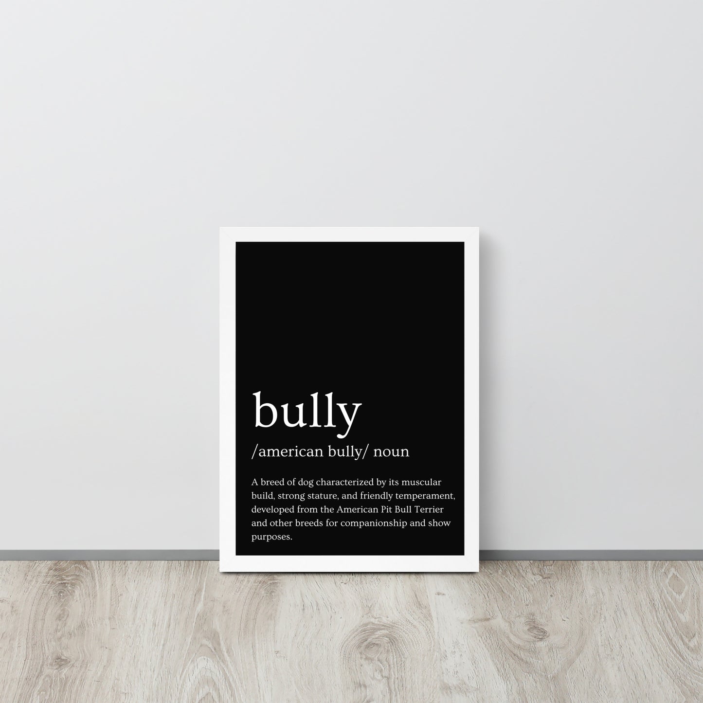 The American Bully breed is defined on a framed dictionary bully poster.